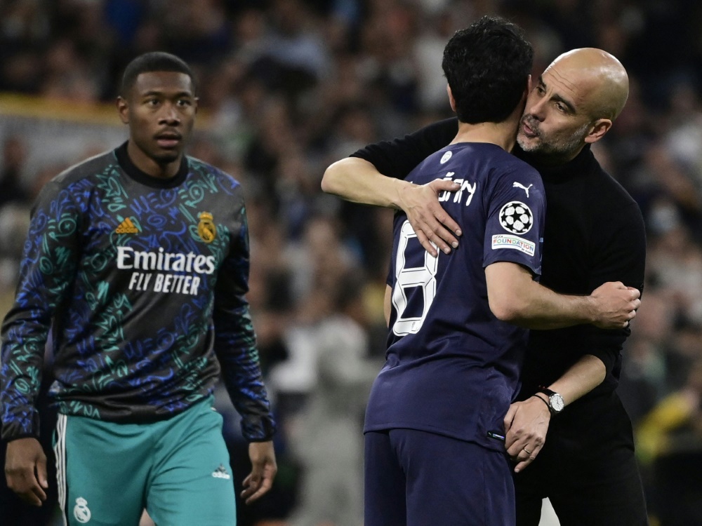 Guardiola (r.) und Gündogan bei City (Foto: AFP/SID/JAVIER SORIANO)