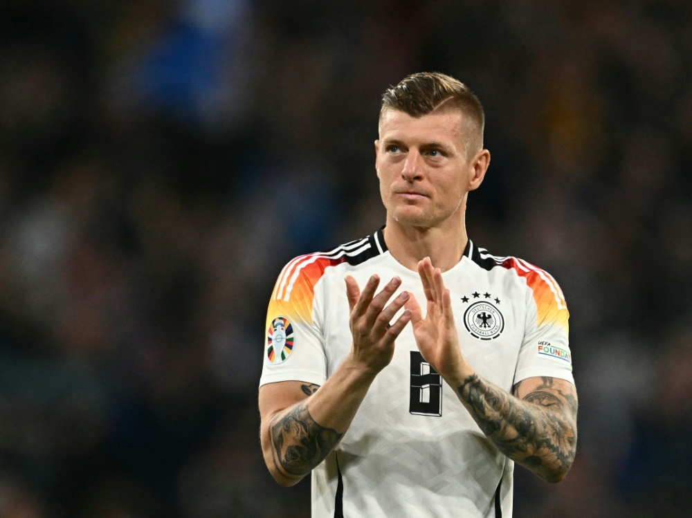 Toni Kroos nach dem Sieg über Schottland (Foto: AFP/SID/FABRICE COFFRINI)