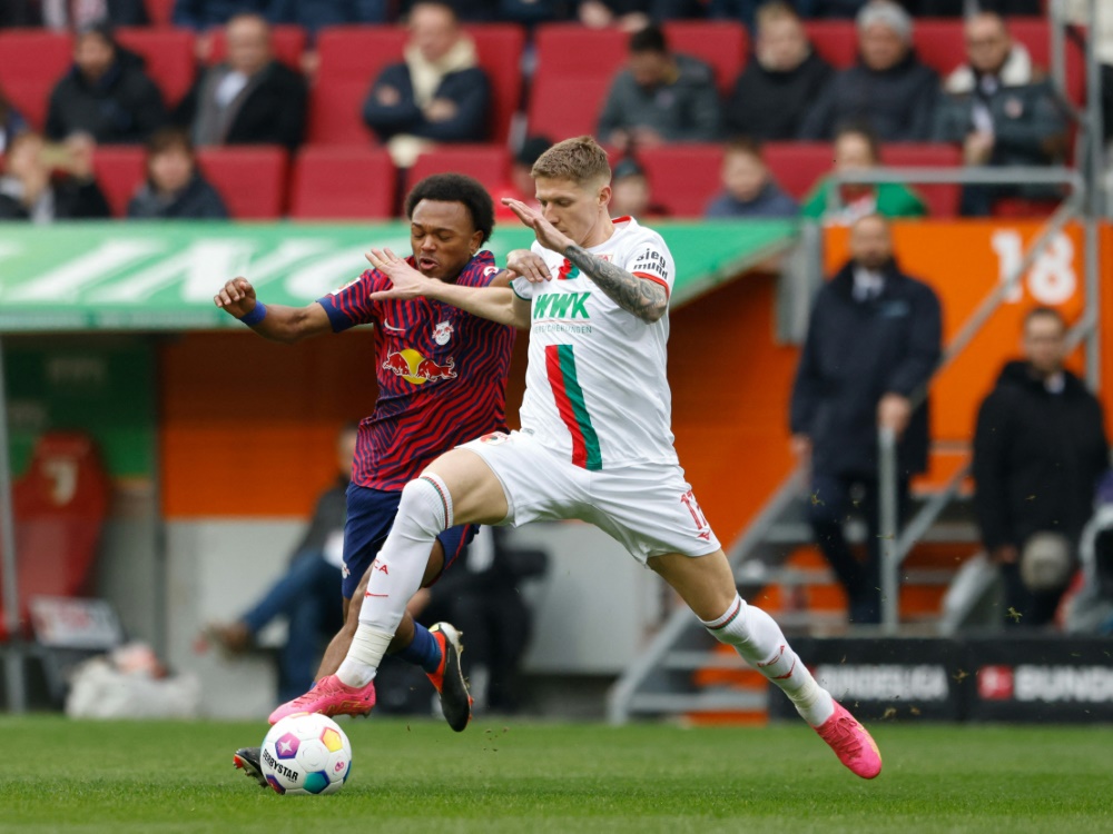 FCA-Profi Kristijan Jakic (r.) (Foto: AFP/SID/MICHAELA STACHE)